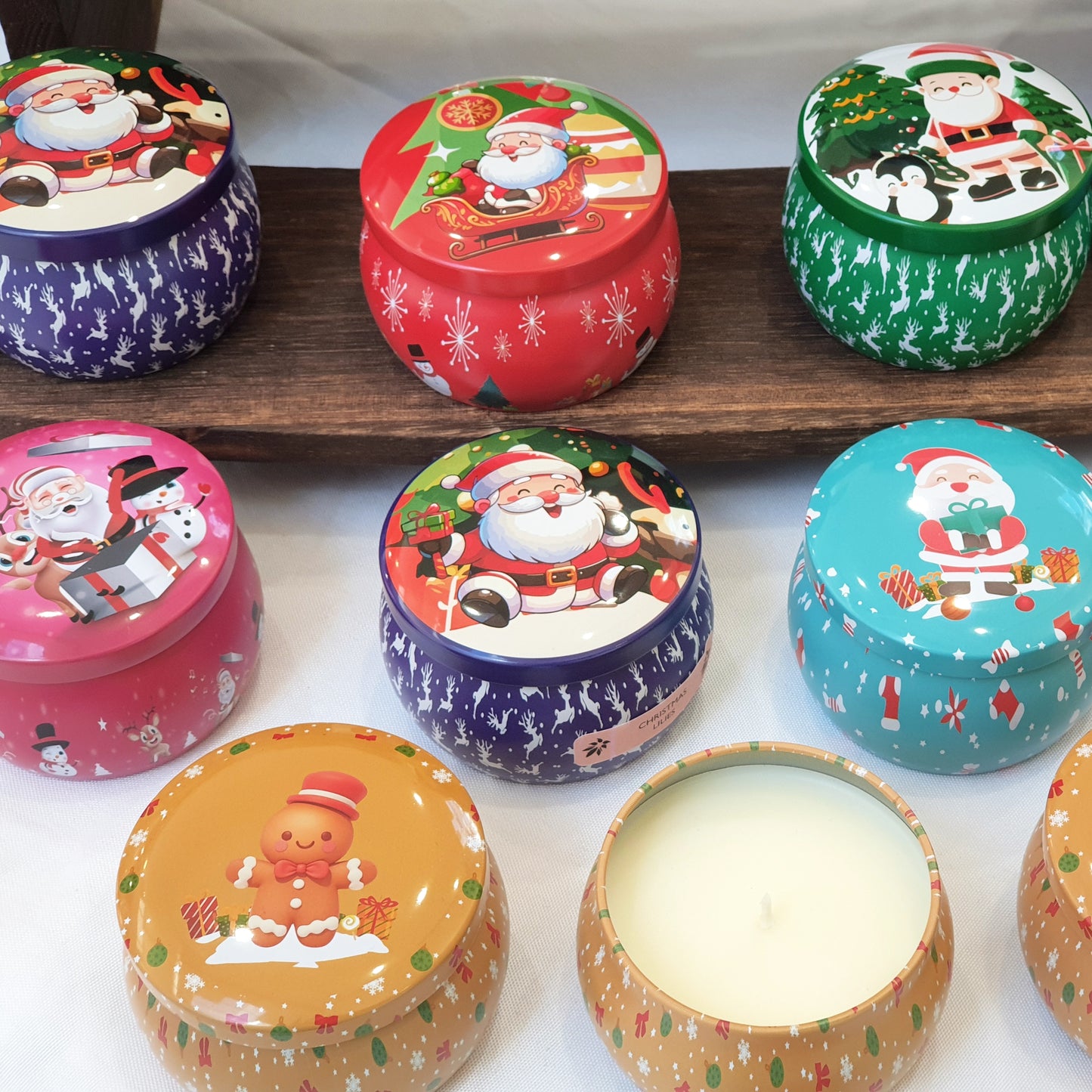 Christmas candle tins